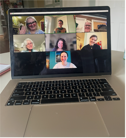 Open laptop showing a Zoom call