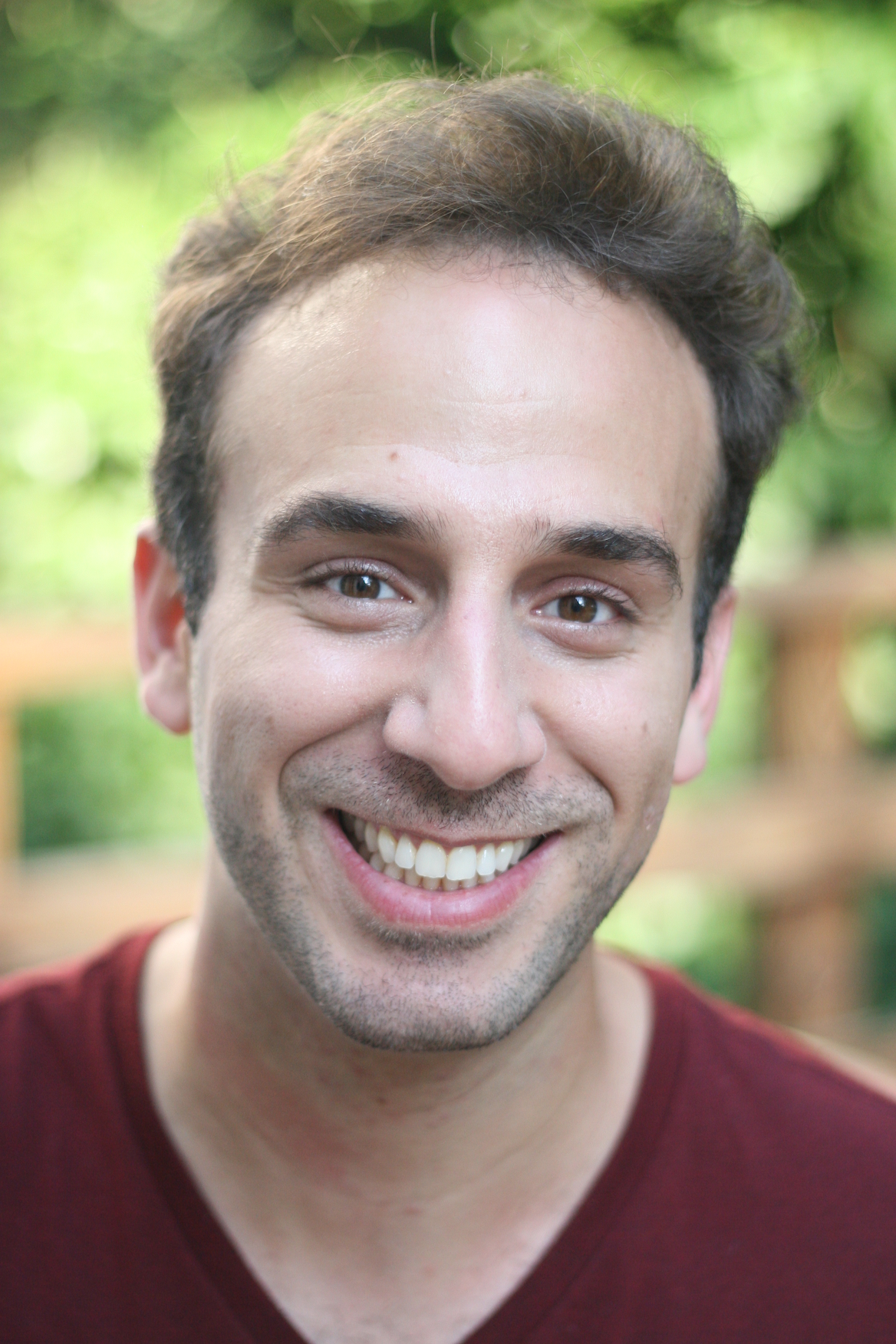Headshot of Mohamed Shalabi smiling